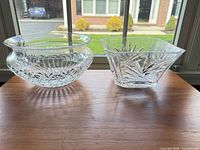 Round and square Waterford crystal bowls on table