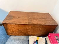closed view of wooden trunk top and front