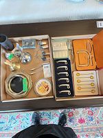 Overview of both trays showing majority of bar and serving pieces