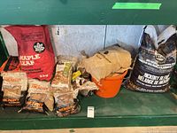 Entire group of assorted wood fuel items on shelf