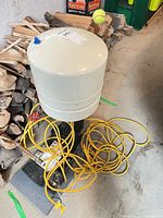 Full view of pump, pressure tank, cords and valves