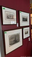Overall wall view showing all four framed prints to illustrate quantity, framing style, and relative sizes