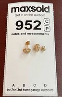 earrings on lot card showing size and form