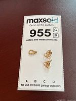 Pendant and earrings grouped on lot card