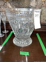 Full view of Waterford crystal champagne bucket on table
