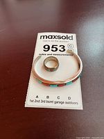 Bracelet and ring on lot card showing overall look and size