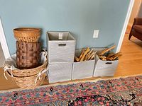 Group shot of wicker baskets, fabric storage cubes and hangers