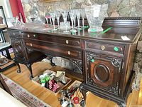 Full front view of buffet with carved details