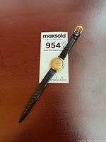 Full view of watch with strap