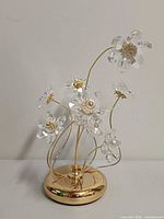 Front view of crystal flower bouquet figurine on gold-tone base