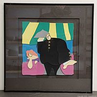 Full view of the framed collage artwork