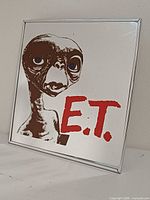 Front view of mirror showing E.T. graphic and frame
