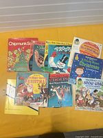 All seven books laid out showing covers and some record sleeves