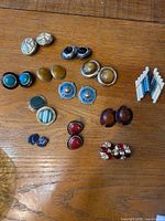 Front view of all 12 earring pairs laid out