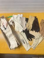 Full assortment of gloves laid out showing colours and styles