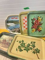 Group shot showing all five trays with distinct designs
