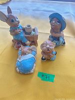 Front view of four Pendelfin bunny figurines
