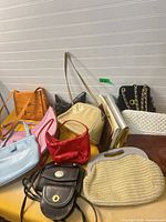 Group view of multiple purses on table