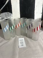 Front view of six frosted glasses displaying Candy Stripe colors