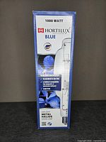Front of boxed EYE Hortilux Blue 1000 W metal halide grow lamp