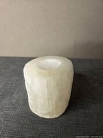 Front view of cylindrical selenite tealight holder