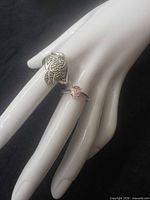 Both rings displayed on mannequin hand