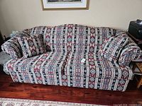 Full front view of Simmons 3-seat sofa showing overall design and condition