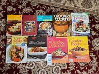 All nine cookbooks laid out together for full lot view