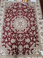 Full view of burgundy oriental rug
