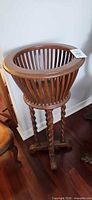 Full view of walnut slatted basket-top fern stand