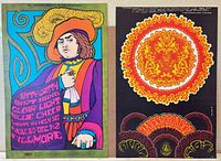 Both posters side by side showing overall condition and size contrast