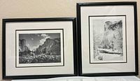 Both framed Yosemite photographs side by side