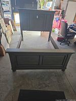 Full view of bed frame components assembled on floor