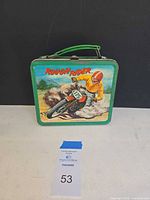 Front view of Rough Rider tin lunchbox