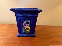 front view showing pansy tile inlay and overall shape