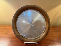 Front view showing brushed silver centre and gold rim