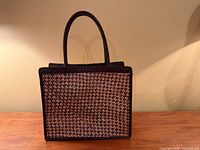 Front view showing woven diamond pattern and overall shape