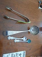 All four flatware pieces on tabletop
