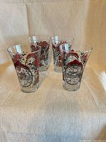 Full view of four Coca-Cola floral tumblers