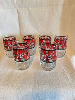 Front view of six Coca-Cola tumblers