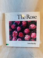 Front cover showing title, author, and rose imagery