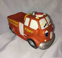 3/4 front view showing FDNY side lettering and overall form