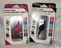 Front view of both sealed Travelocity retractable audio cables