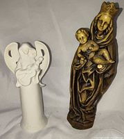 Pair of figurines side by side