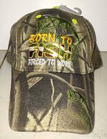 Front view of camouflage cap with embroidered text