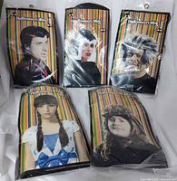 All five sealed Halloween wigs front view