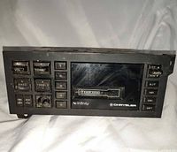 Front view showing buttons, cassette slot, logos