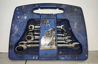 Front of closed case showing wrenches in tray