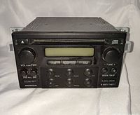 Front view showing faceplate, controls, LCD, anti-theft label