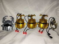 Front view showing all five Beetleborgs toys in a row